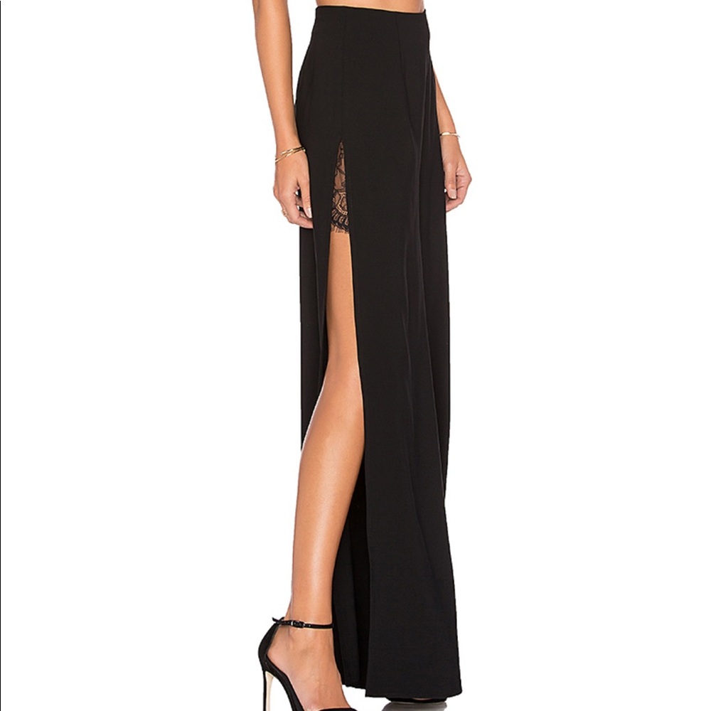 Black statement wide leg pants with high slit